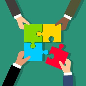 Puzzle pieces hands