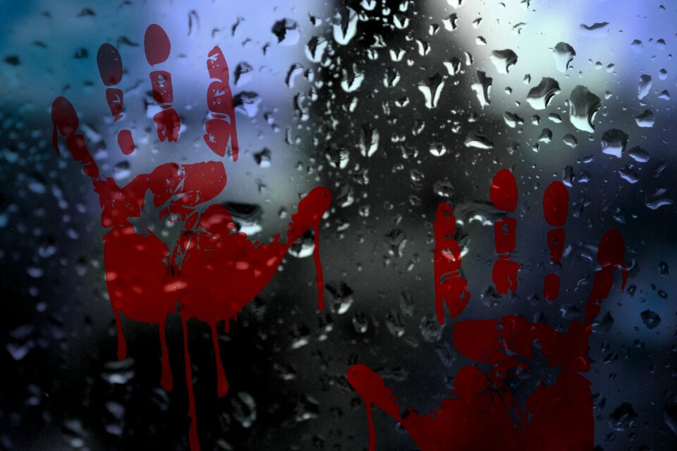 Handprint bloody drop of water