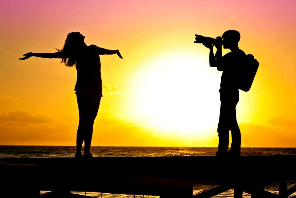 Camera couple dusk