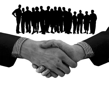 Handshake teamwork executive