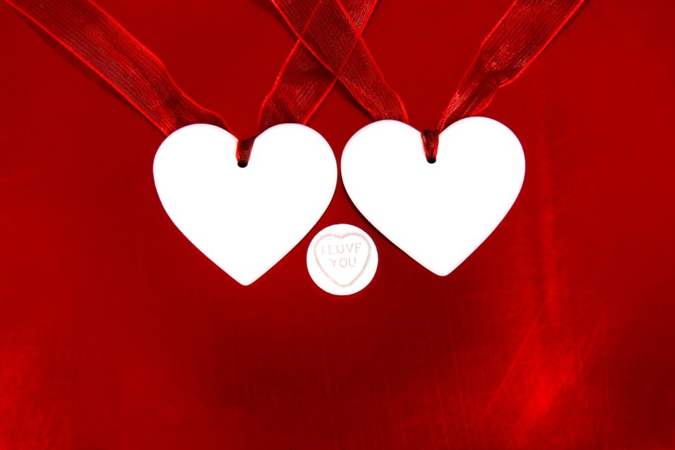 Hearts On Red Background