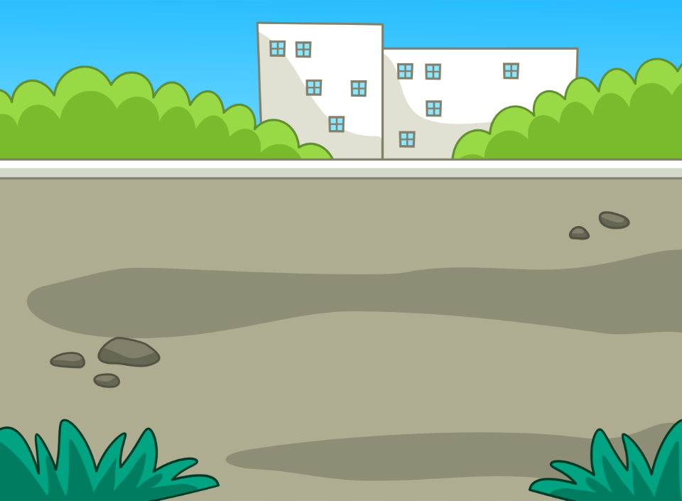 White building behind wall