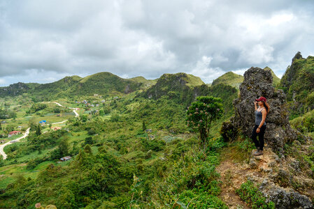 Woman looking over the Hilly Landscape