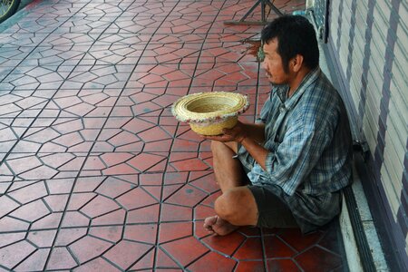 Sitting man poverty