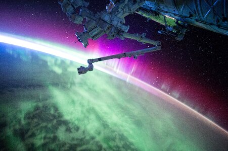 Satellite Orbit Earth Aurora Borealis photo