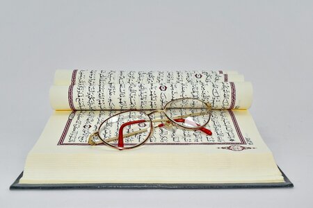 Arabic book eyeglasses photo