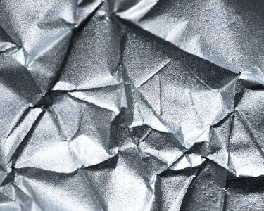 Silver Crumpled Paper Texture photo