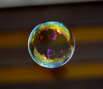 Soapy water make soap bubbles float