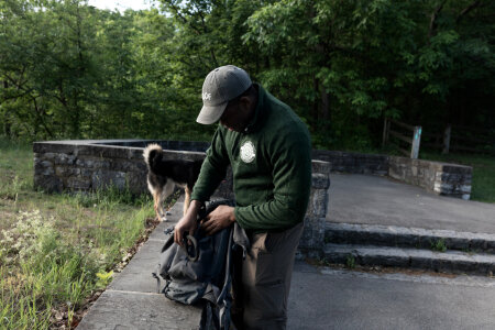 Man opening bag photo