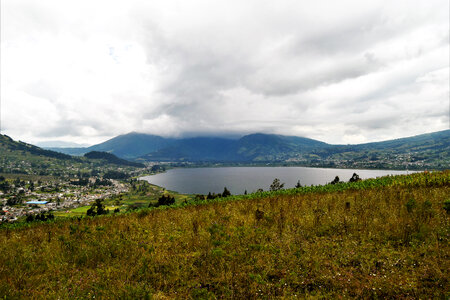 Heavy clouds over the lake scenic landscape in Otavalo