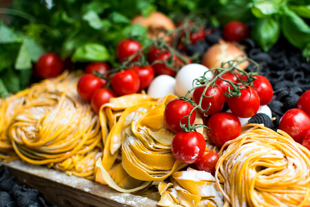 Pasta, tomatoes and other Italian ingredients photo