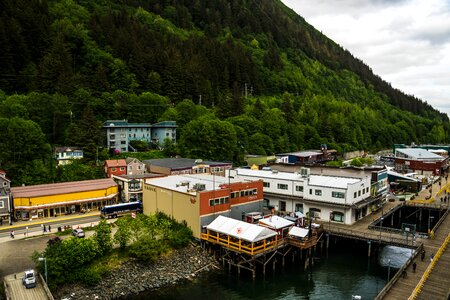 Town of Juneau and buildings under the mountain in Alaska photo