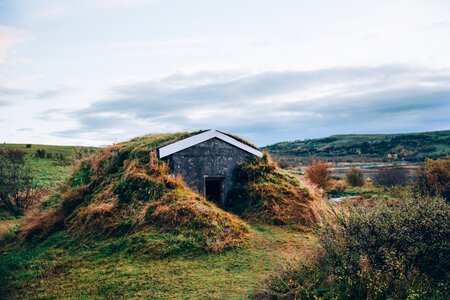 Iceland Hut In Grassy Hill photo