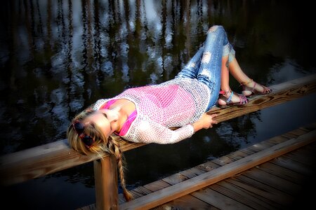 Laying down outdoors young