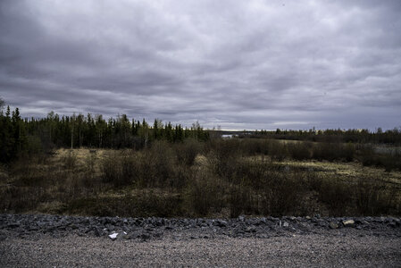 Heavy Clouds over the swampy landscape and forest near Dettah photo