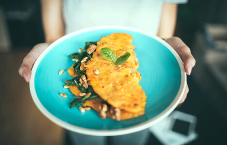 Closeup of Blue Plate with Delicious Omelette photo