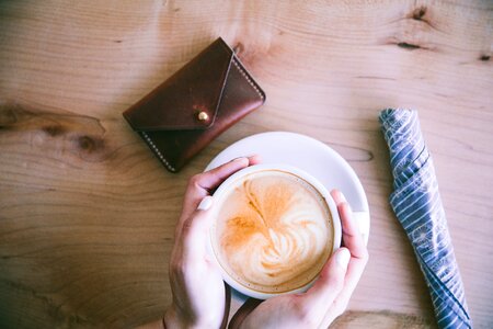 Hands Cupping Coffee photo