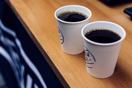 Two takeaway cups of filtered coffee photo