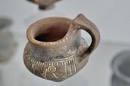 Earthenware medieval pitcher photo