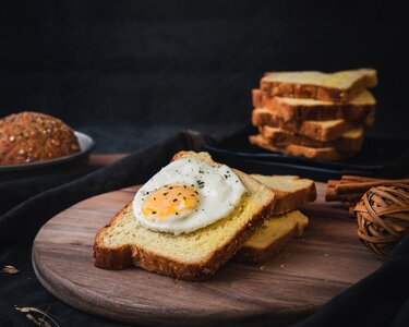 White toast with fried eggs photo