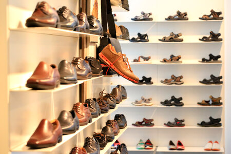 Shoes on the shelf at the shoe store photo