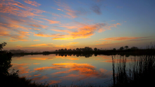 Sunset and Dusk Skies over the water at Big Cypress National Preserve