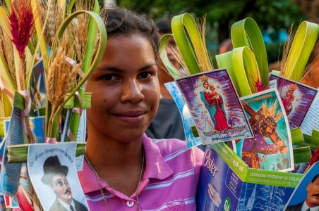 girl selling for Palm Sunday photo