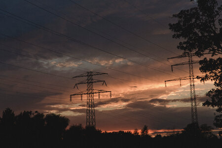 Sunset over High Voltage Pylons photo