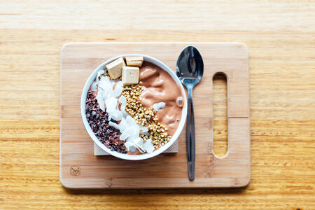 Chocolate Bowl on Wooden Board Delicious Sweet Breakfast photo