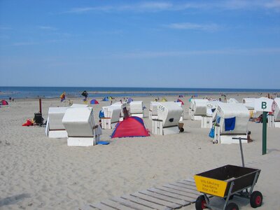 Clubs beach chair sand photo