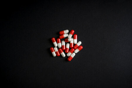 Medicine Pills Red and White Capsules photo