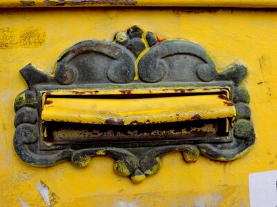 Baroque cast iron mail slot photo