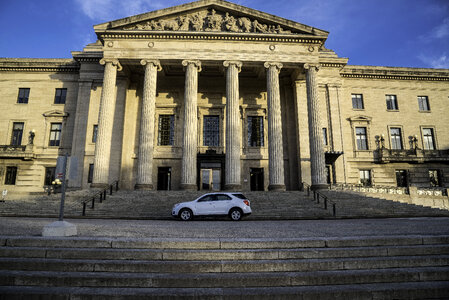 Car in front of a capital building in Winnipeg