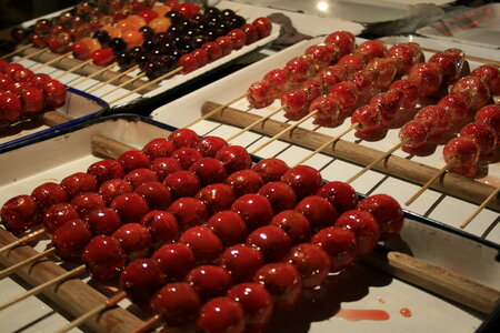 TangHuLu - a Chinese specialty of sugar-coated fruits on a stick photo