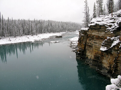 Athabasca River landscape with bluff in Jasper National Park, Alberta, Canada photo