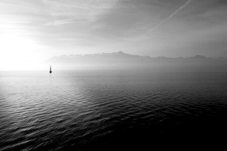 Sailboat in a Calm Sea Black and White Photo photo
