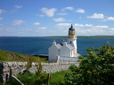A lighthouse and accomodation in the north of Scotland photo