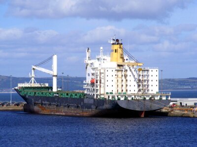 Tanker docks cranes