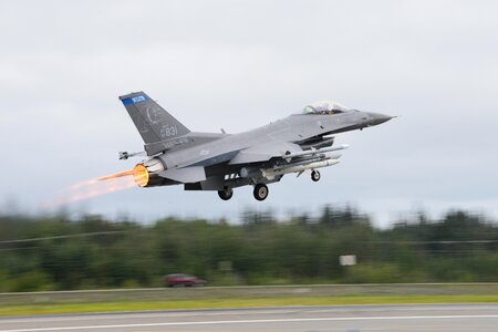 An F-16 Fighting Falcon takes off photo