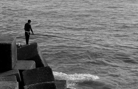 Fishing rod fishing wave photo