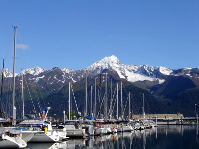 Boats in the harbor and Mountains in the Landscape in Seward, Alaska