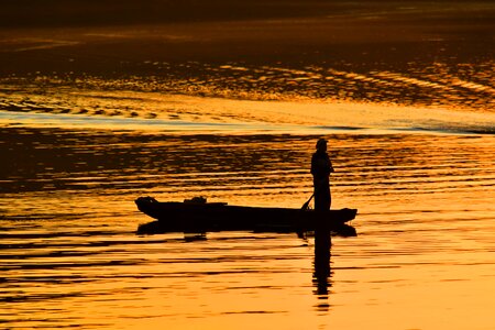 Beautiful Photo fisherman paddle photo