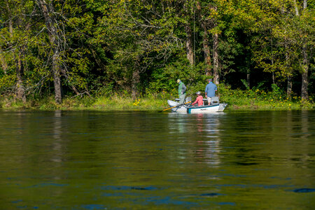 Group fly fishing from drift boat on White River-1 photo