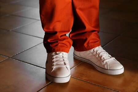 Sneakers reddish pants photo