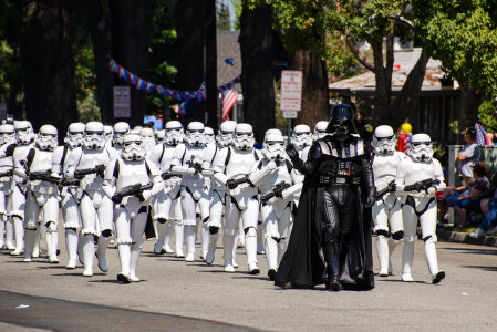 Darth Vader and storm troopers marching in parade