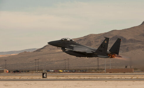 An F-15E Strike Eagle takes off photo