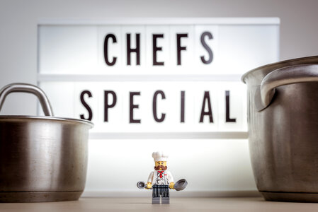 Cheerful miniature chef. Chef’s special concept