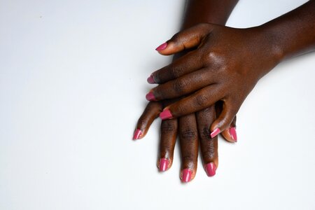 Ebony varnished nails gestural photo