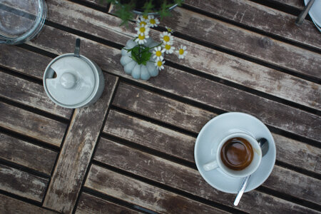 Cup of Espresso on a Wooden Table photo