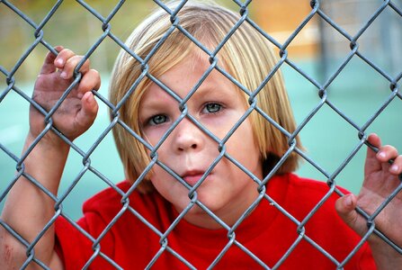 Chain link young child photo